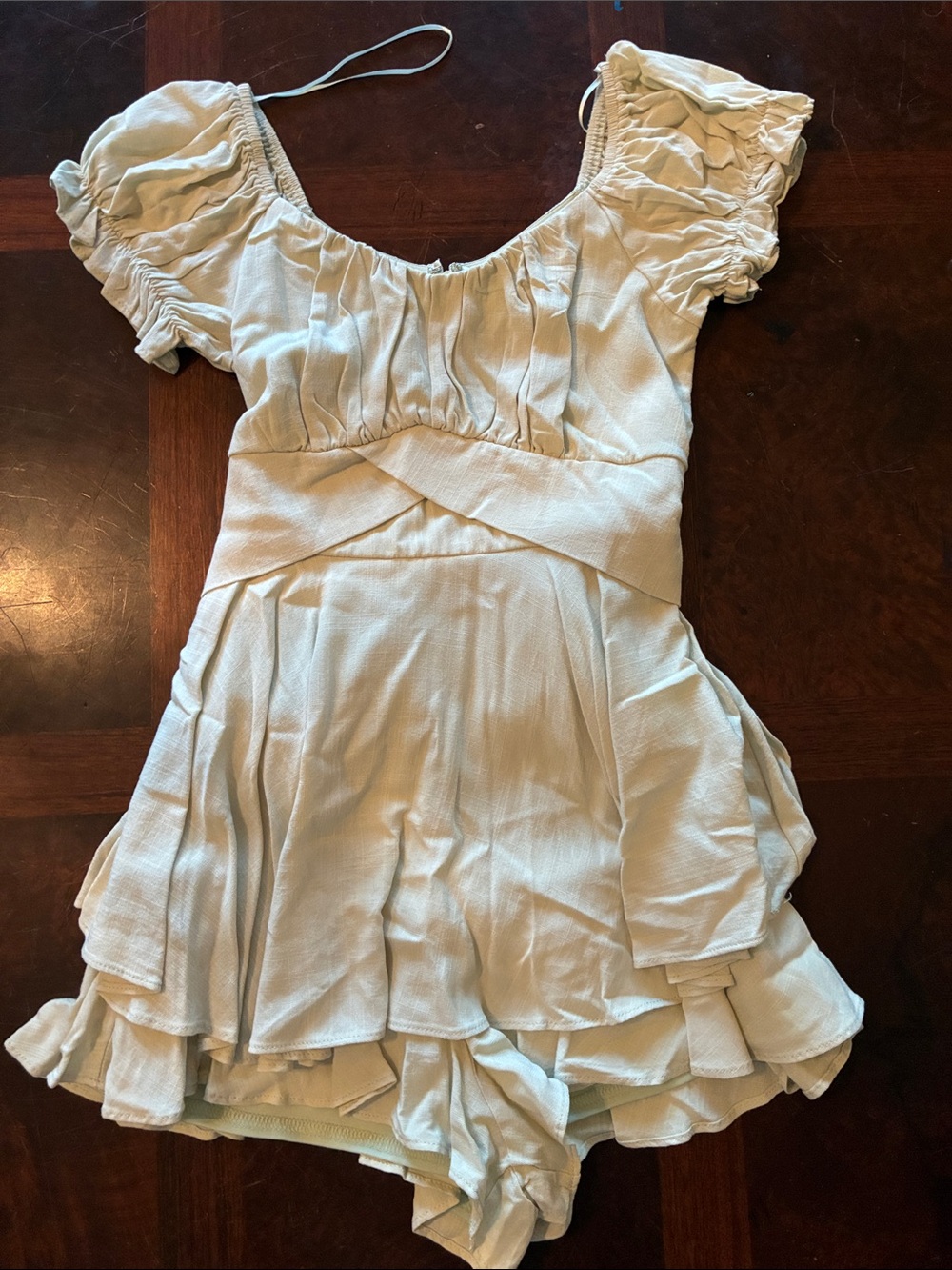 Altar'd State Cream Ruffle Puff-Sleeve Skort Dress in light sage green.